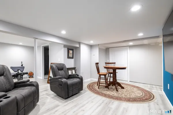 a living room with furniture a couch and a coffee table