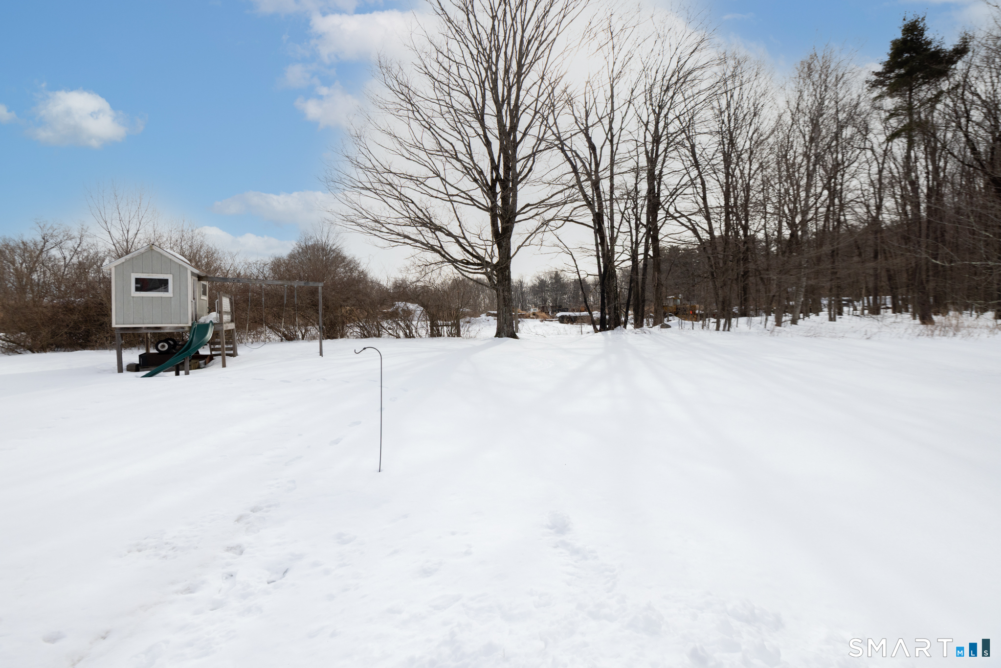 351 Platt Hill Road Winchester, CT 06098 - Photo 34 of 40 a street view covered with snow