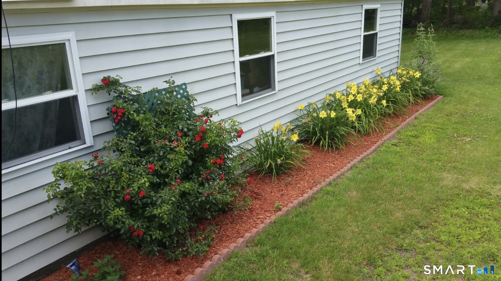 351 Platt Hill Road Winchester, CT 06098 - Photo 36 of 40 a view of a backyard with potted plants