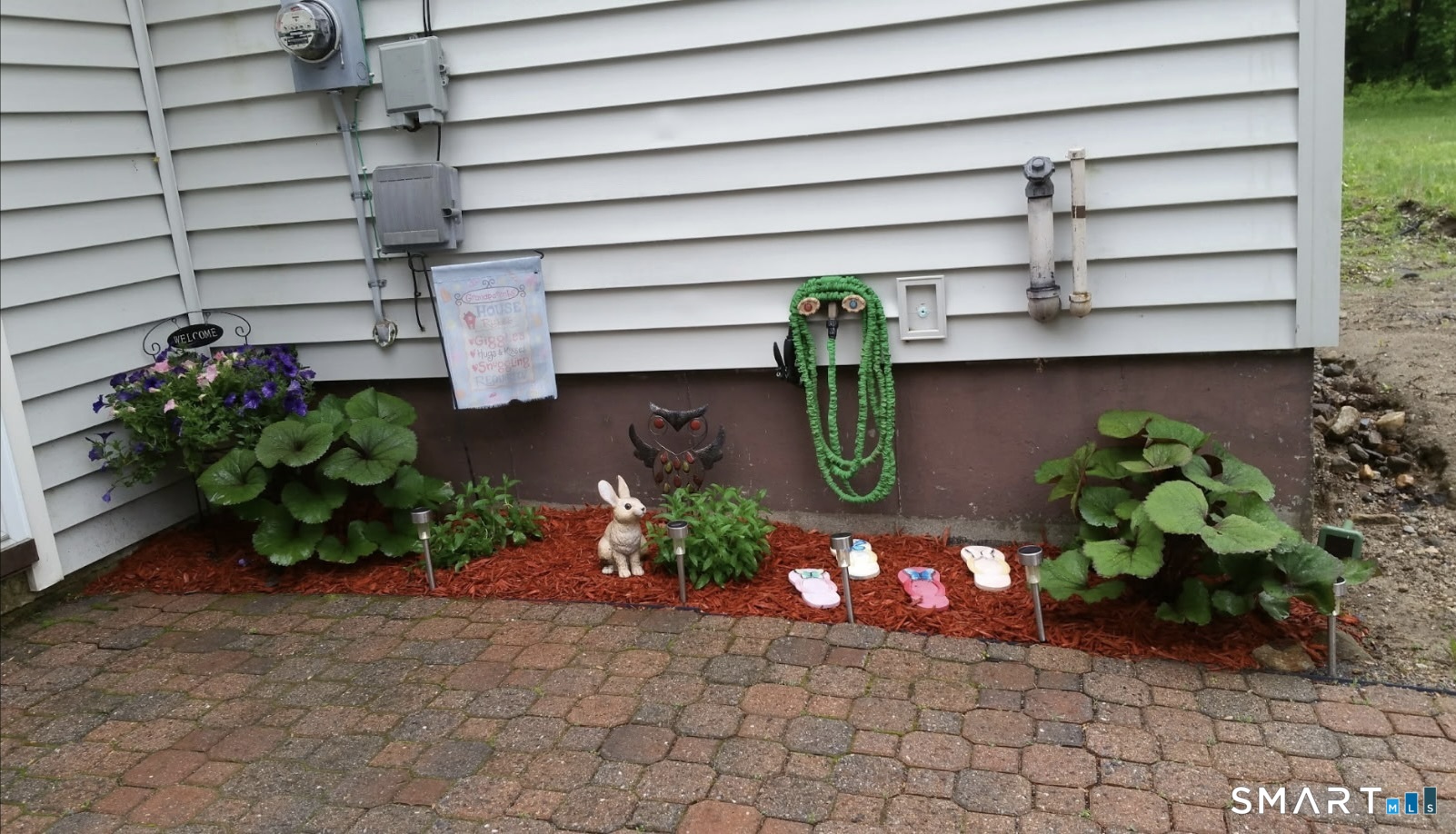 351 Platt Hill Road Winchester, CT 06098 - Photo 38 of 40 a view of a flower in a yard
