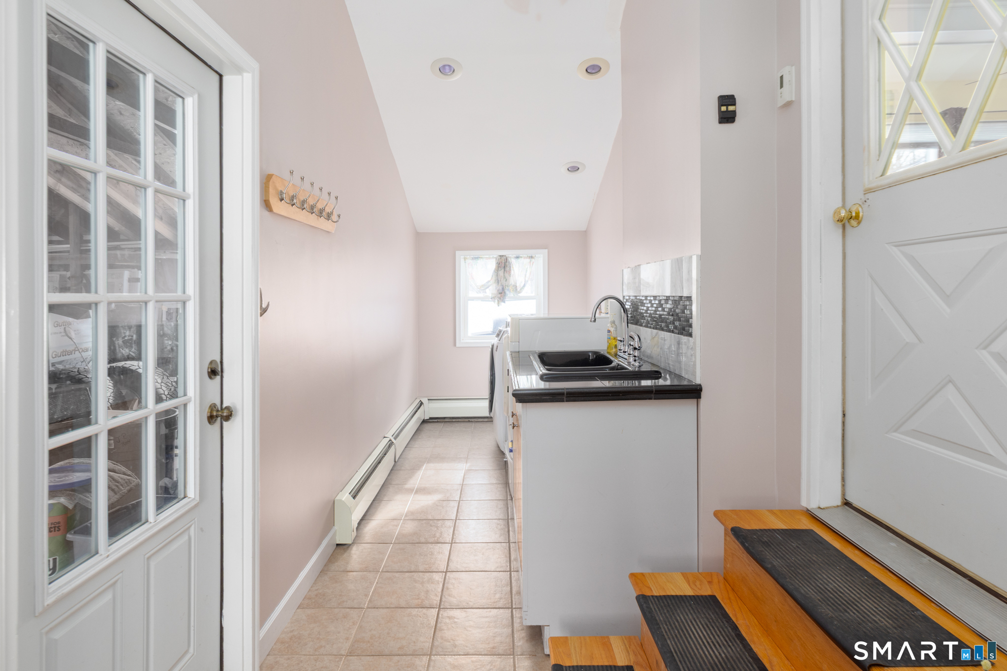 351 Platt Hill Road Winchester, CT 06098 - Photo 5 of 40 a kitchen with a sink and cabinets