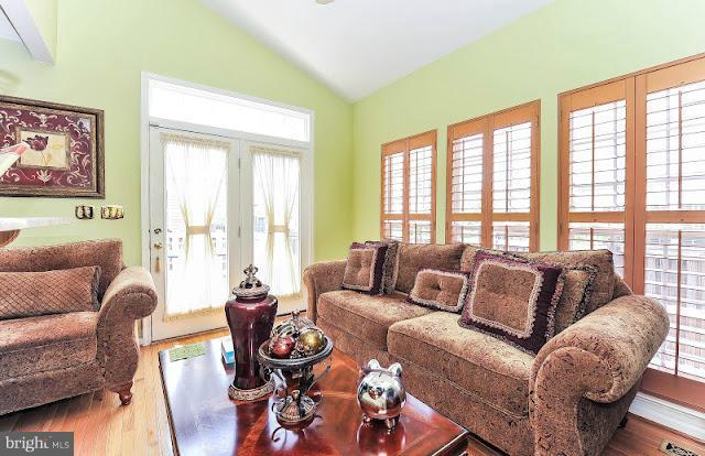 2428 Knapps Way Odenton, MD 21113 - Photo 13 of 30 a living room with furniture and a large window
