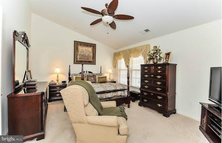 2428 Knapps Way Odenton, MD 21113 - Photo 16 of 30 a living room with furniture and a flat screen tv