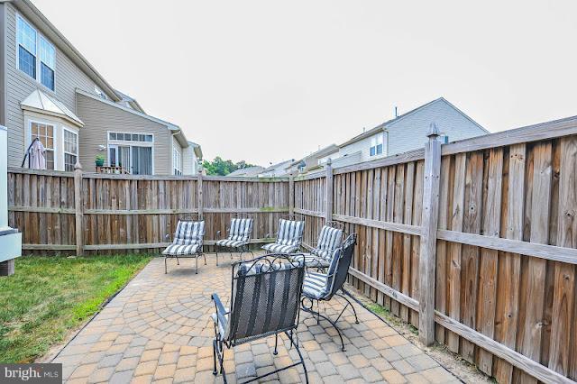 2428 Knapps Way Odenton, MD 21113 - Photo 29 of 30 a view of a deck with furniture and a yard