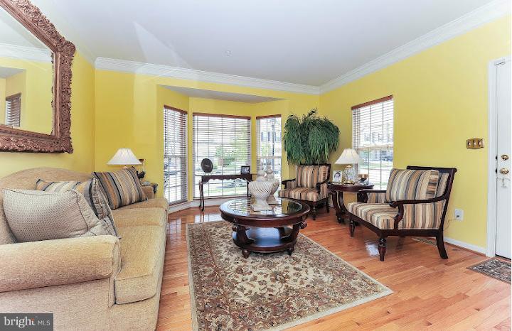 2428 Knapps Way Odenton, MD 21113 - Photo 4 of 30 a living room with furniture and a large window