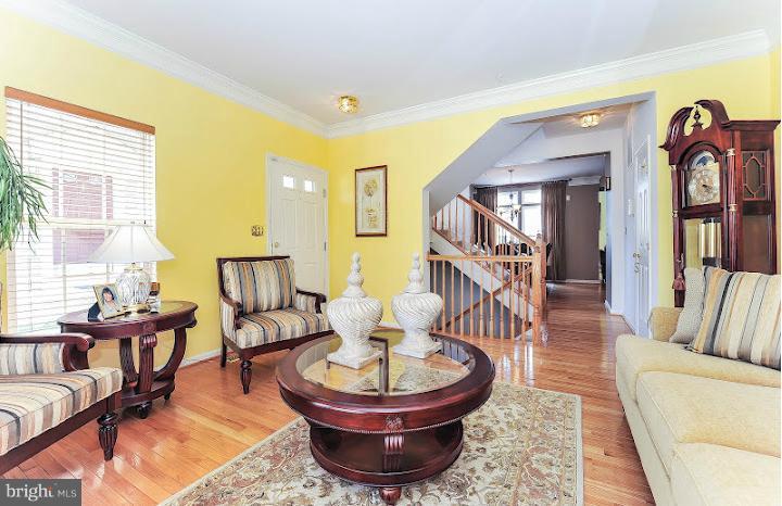 2428 Knapps Way Odenton, MD 21113 - Photo 5 of 30 a living room with furniture and a large window
