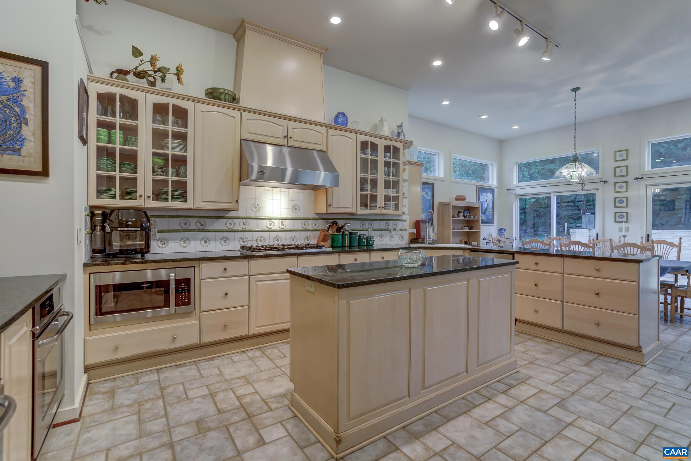 5317 Stony Point Road Barboursville, VA 22923 - Photo 14 of 69 a kitchen with stainless steel appliances granite countertop a stove a sink and a microwave
