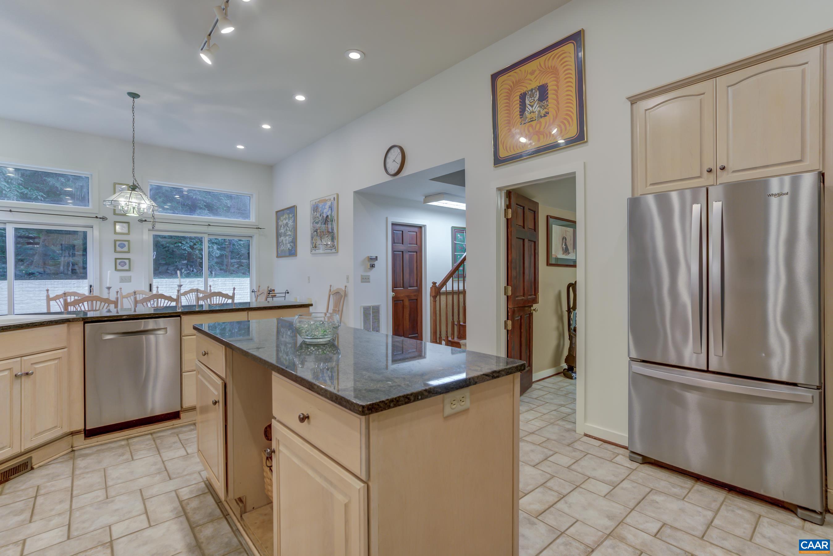 5317 Stony Point Road Barboursville, VA 22923 - Photo 15 of 69 a kitchen with stainless steel appliances granite countertop a refrigerator a sink and a stove