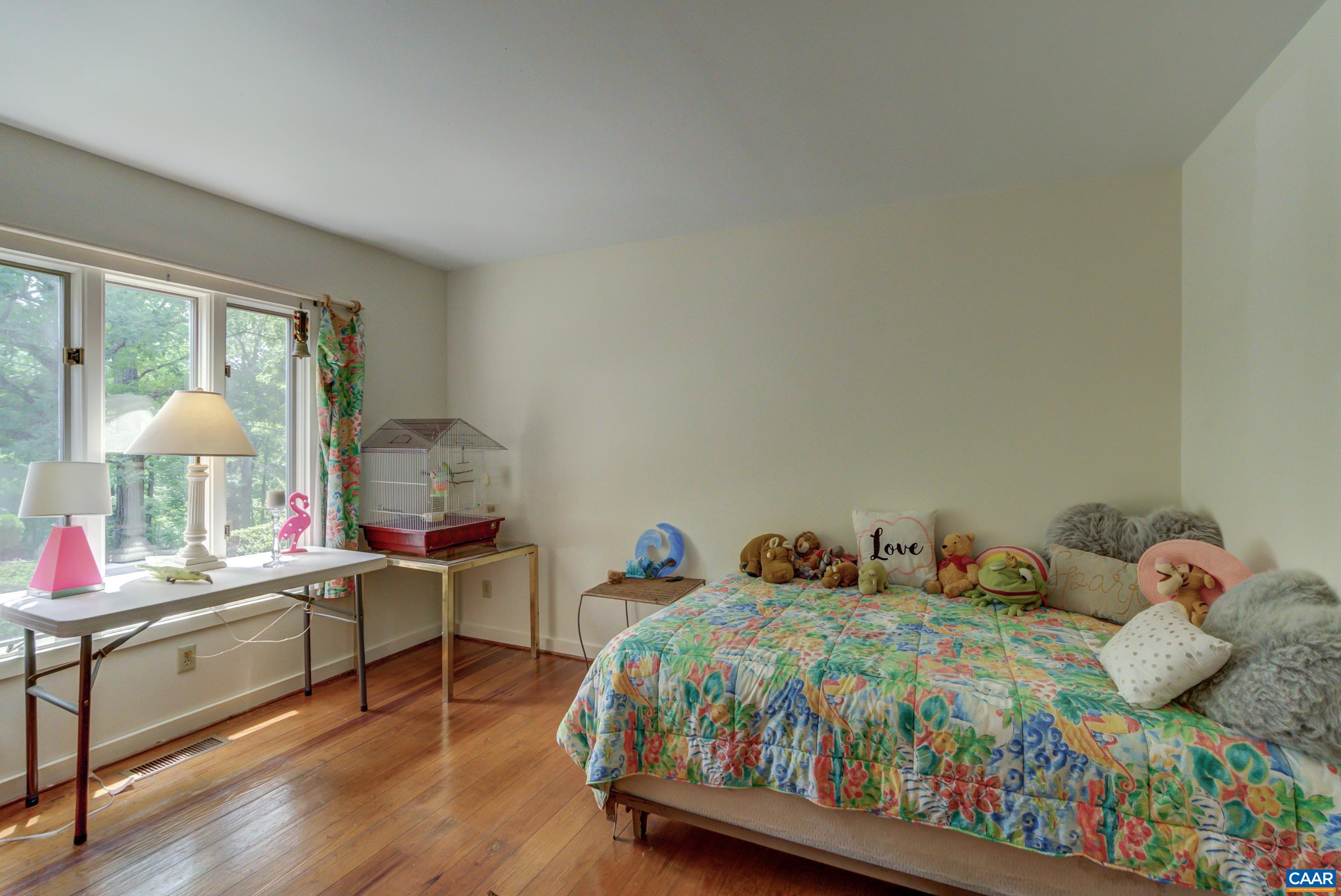 5317 Stony Point Road Barboursville, VA 22923 - Photo 20 of 69 a bedroom with a bed and a table