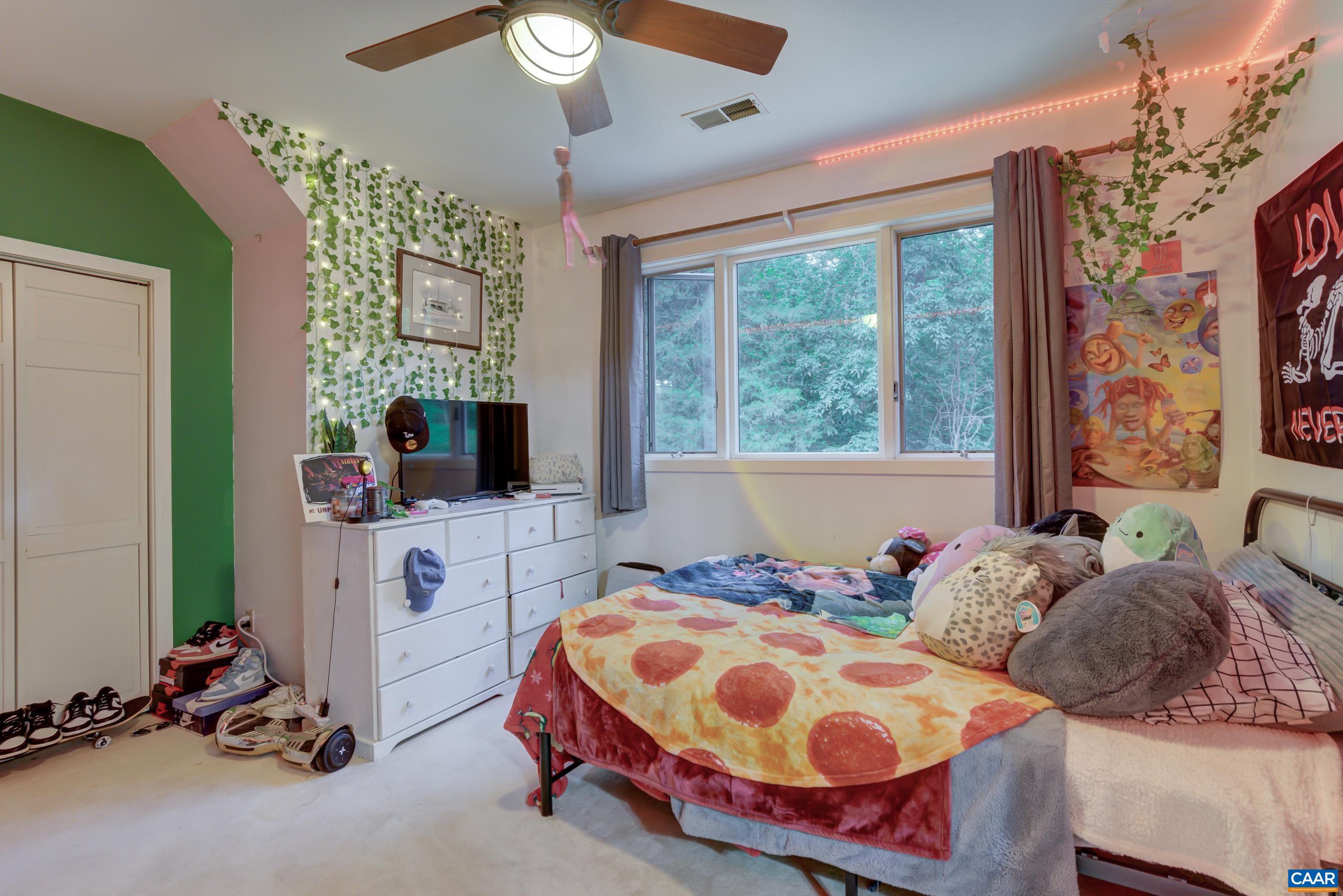 5317 Stony Point Road Barboursville, VA 22923 - Photo 29 of 69 a bedroom with two beds and a large window