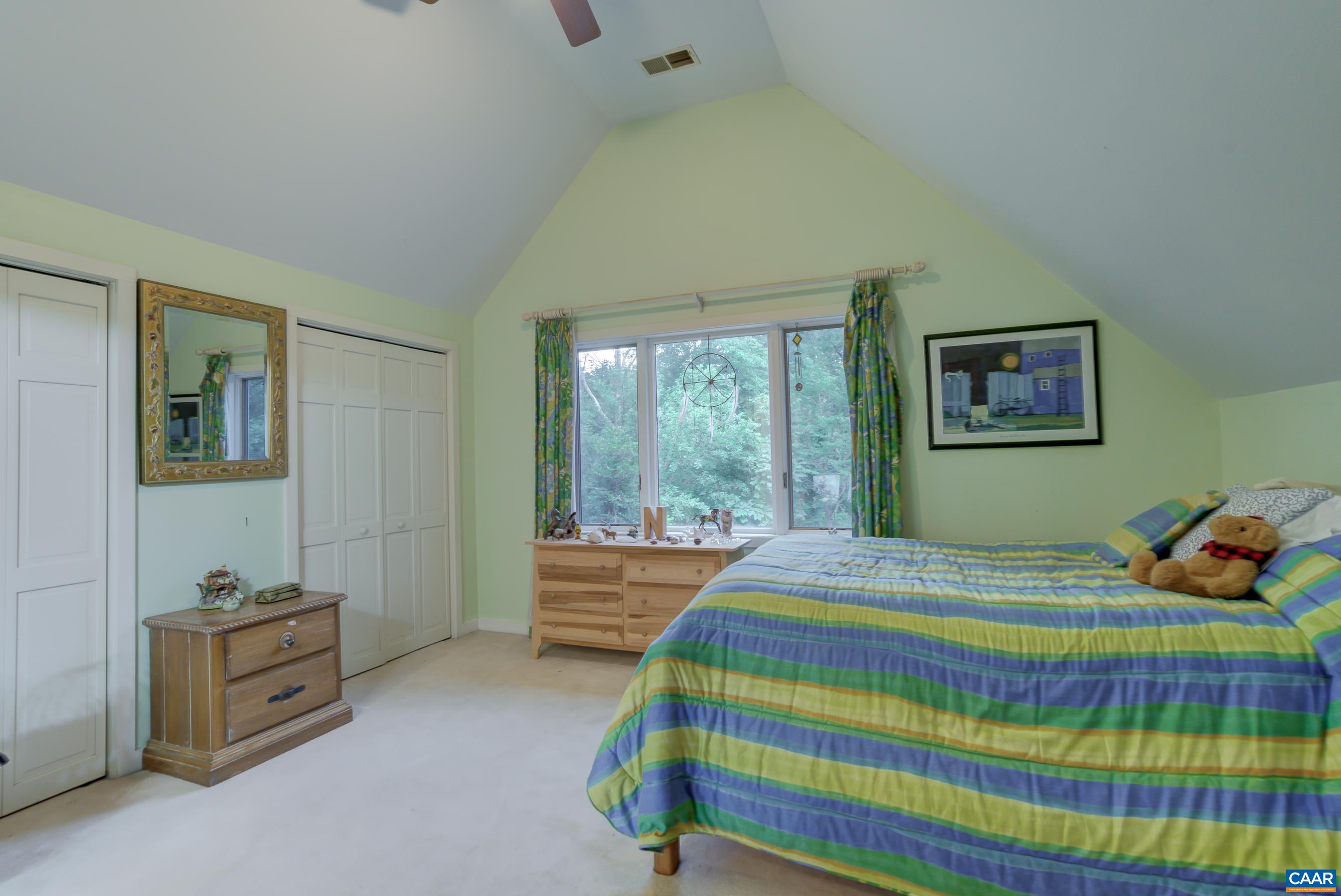 5317 Stony Point Road Barboursville, VA 22923 - Photo 31 of 69 a bedroom with a bed and a window