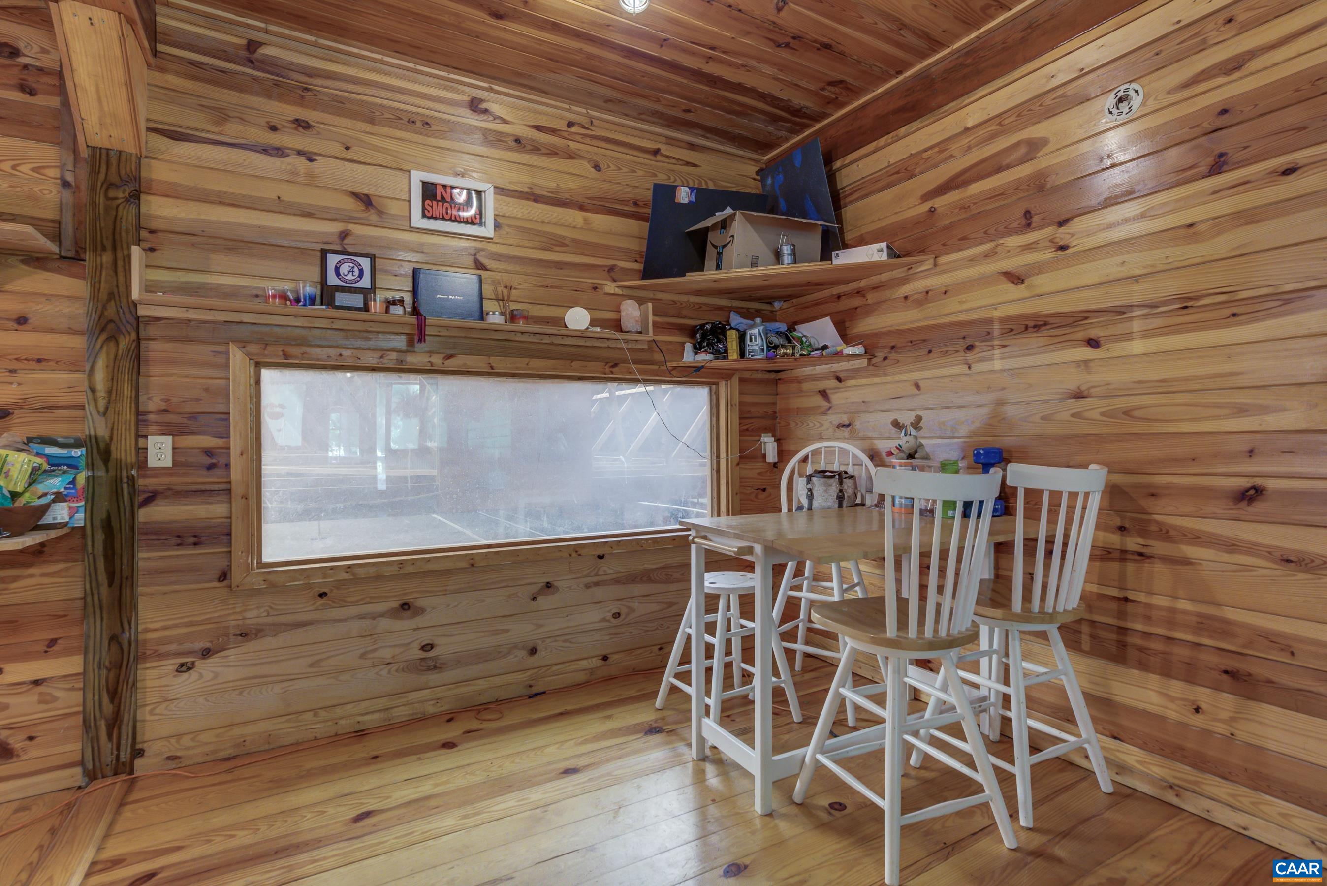 5317 Stony Point Road Barboursville, VA 22923 - Photo 47 of 69 a view of a wooden door with a table and chairs