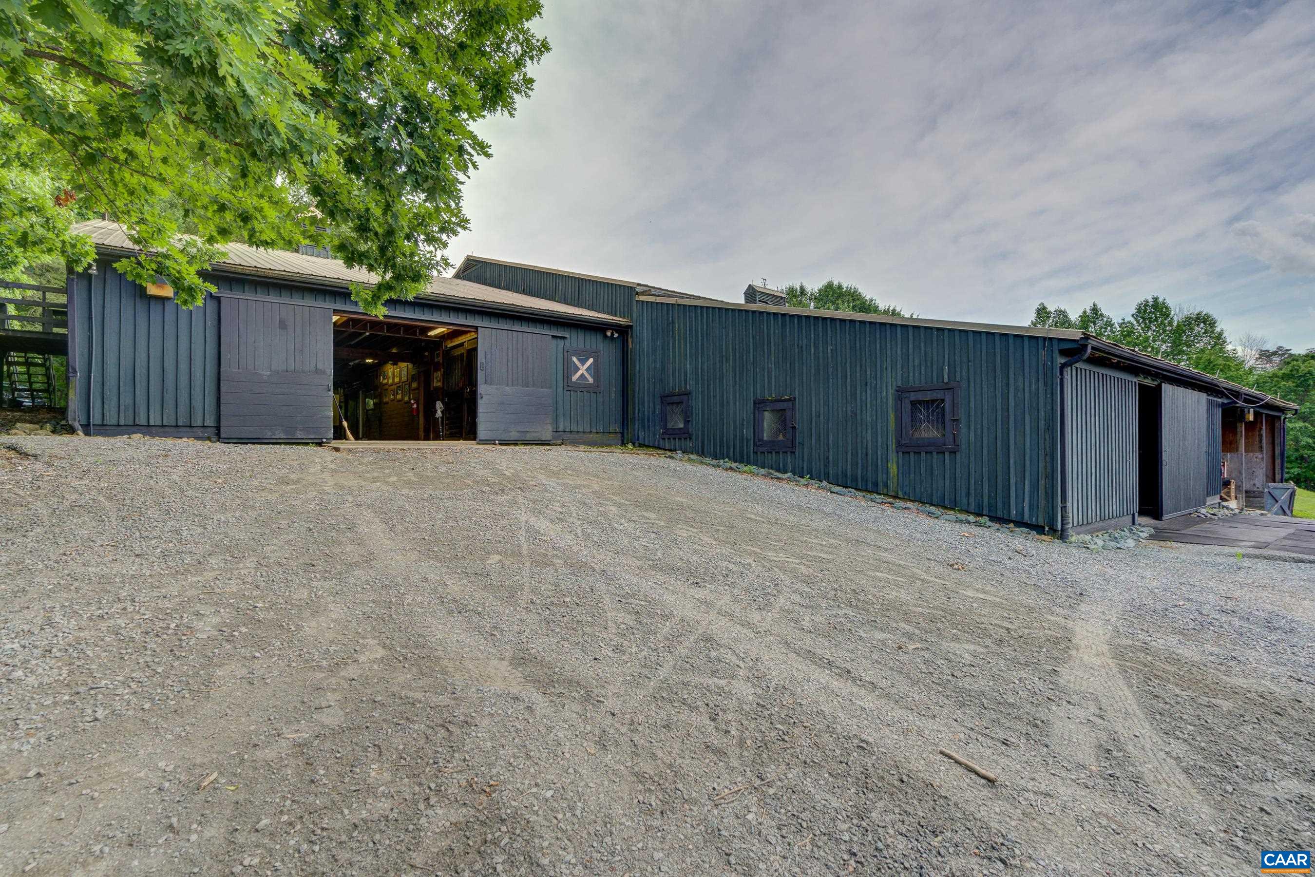 5317 Stony Point Road Barboursville, VA 22923 - Photo 62 of 69 a large house with a large tree