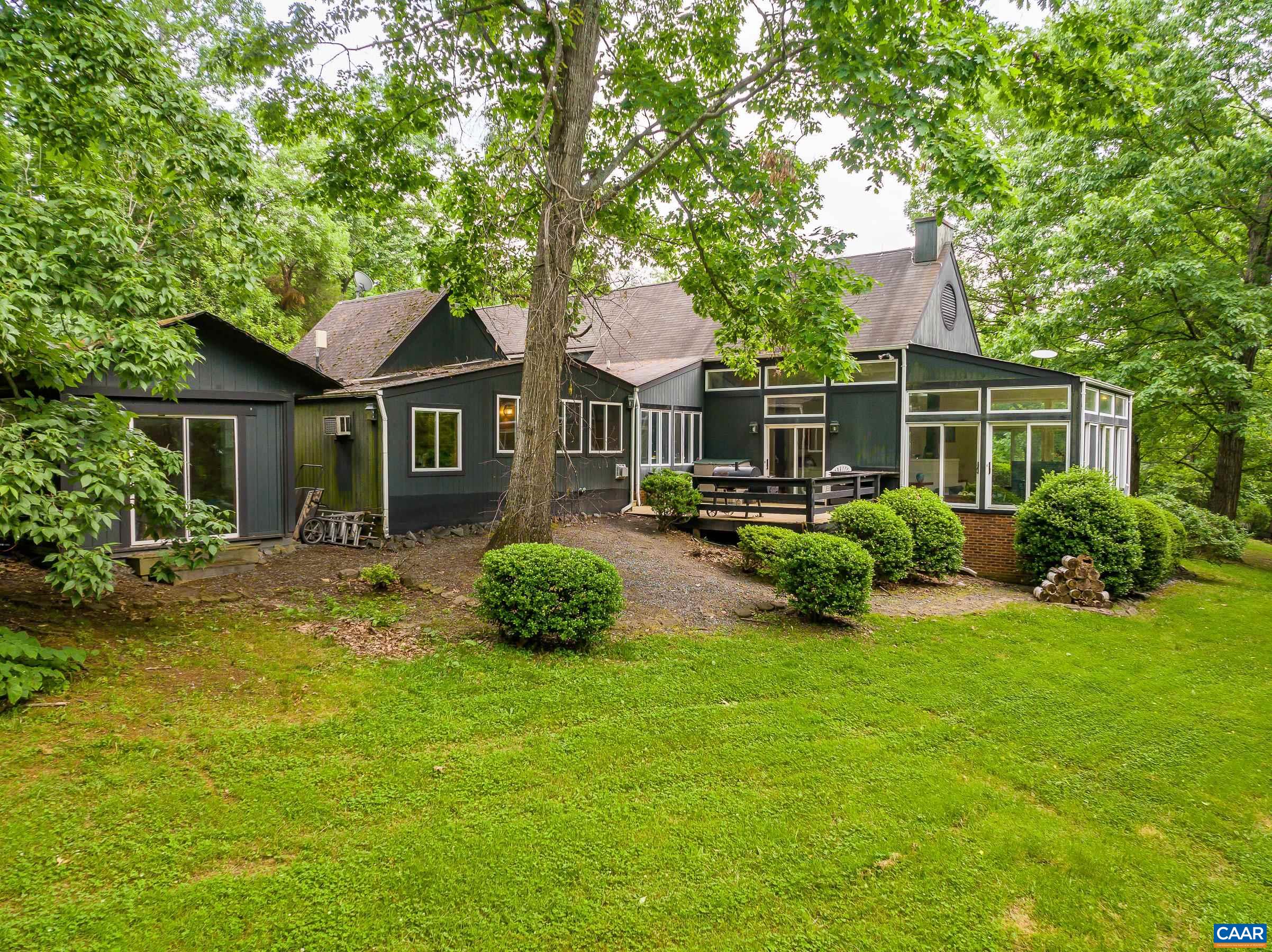 5317 Stony Point Road Barboursville, VA 22923 - Photo 67 of 69 a front view of a house with a yard table and chairs