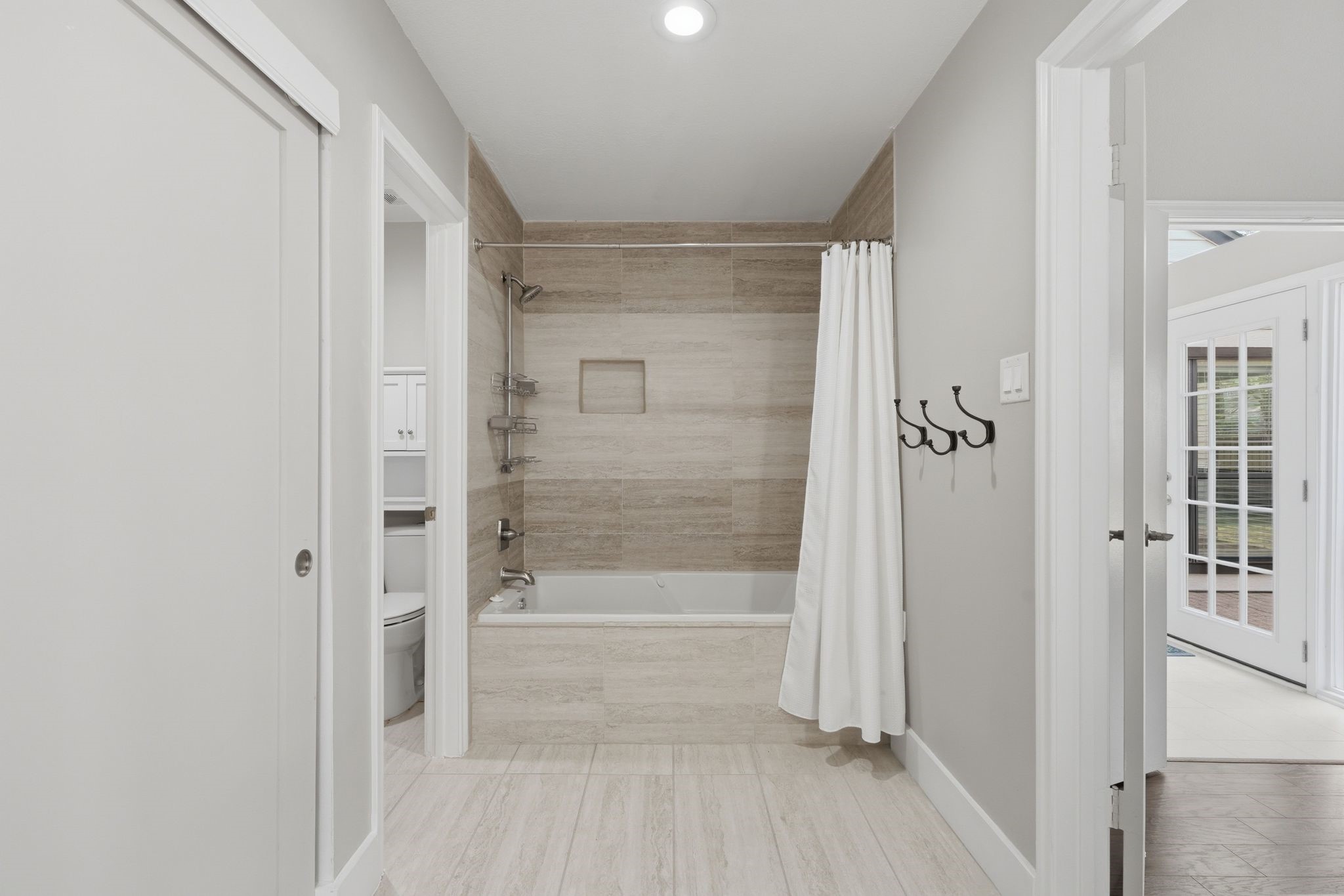 14 Dusky Meadow Place Spring, TX 77381 - Photo 25 of 47 Shower has been renovated with modern neural tiles and fixtures.