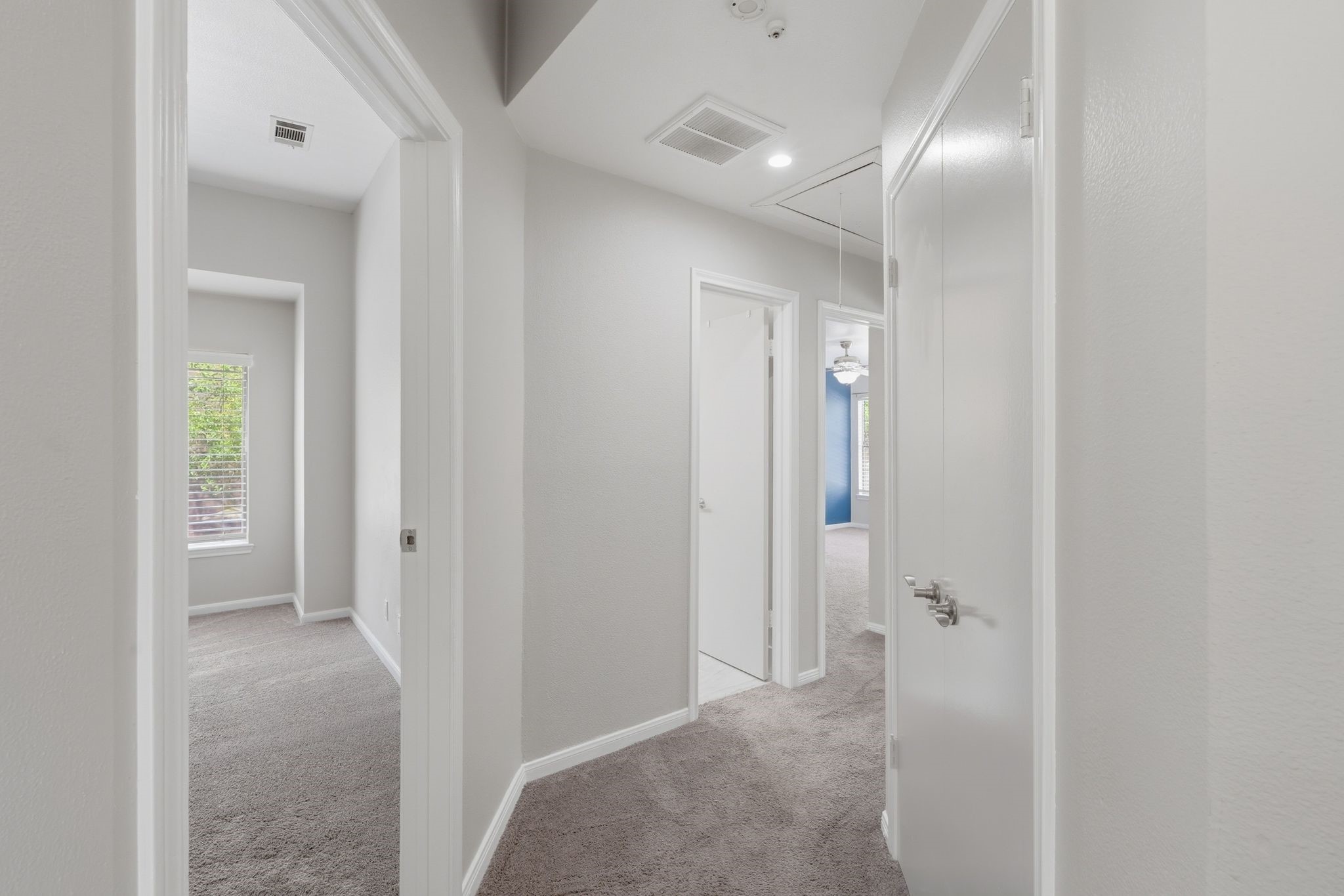 14 Dusky Meadow Place Spring, TX 77381 - Photo 26 of 47 Upstairs hallway, to the left is a spacious secondary bedroom and to the right is a hall closet.