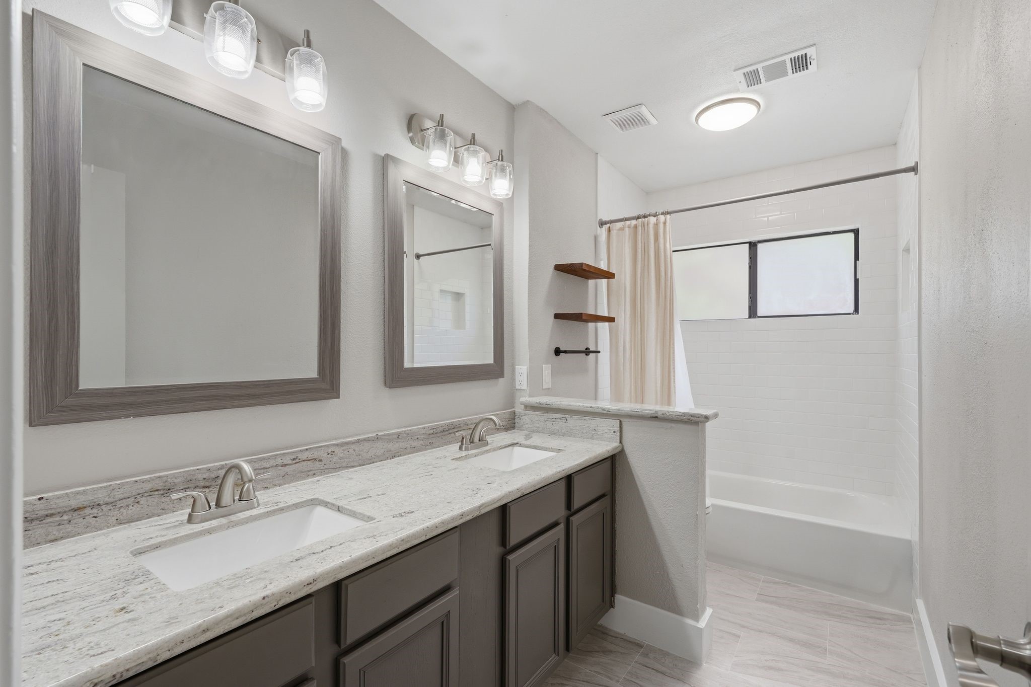 14 Dusky Meadow Place Spring, TX 77381 - Photo 29 of 47 The secondary bathroom that has been fully renovated located upstairs.
