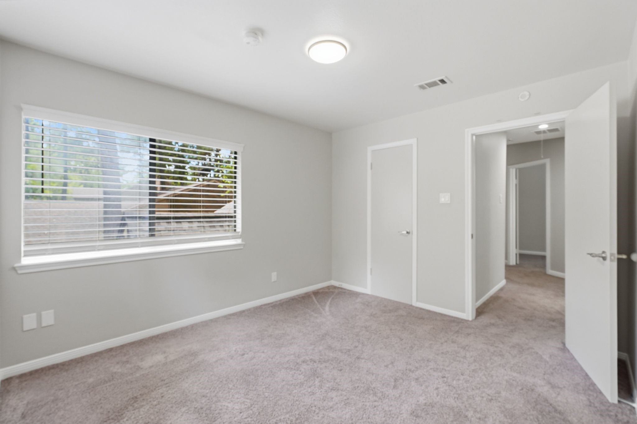 14 Dusky Meadow Place Spring, TX 77381 - Photo 33 of 47 Another view of the secondary bedroom upstairs.