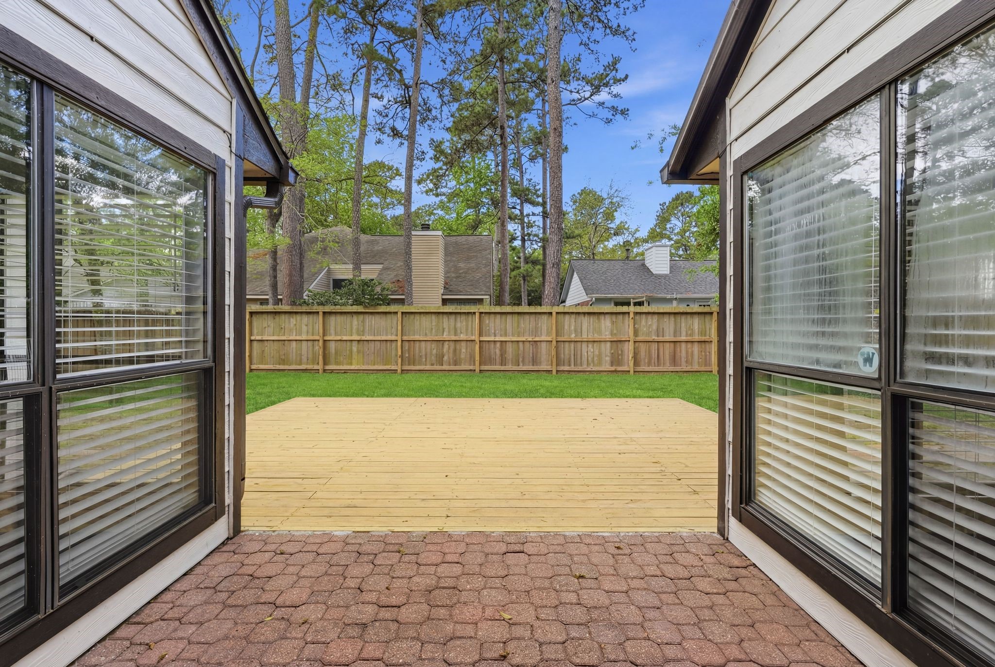 14 Dusky Meadow Place Spring, TX 77381 - Photo 37 of 47 Looking out to new deck in the backyard.