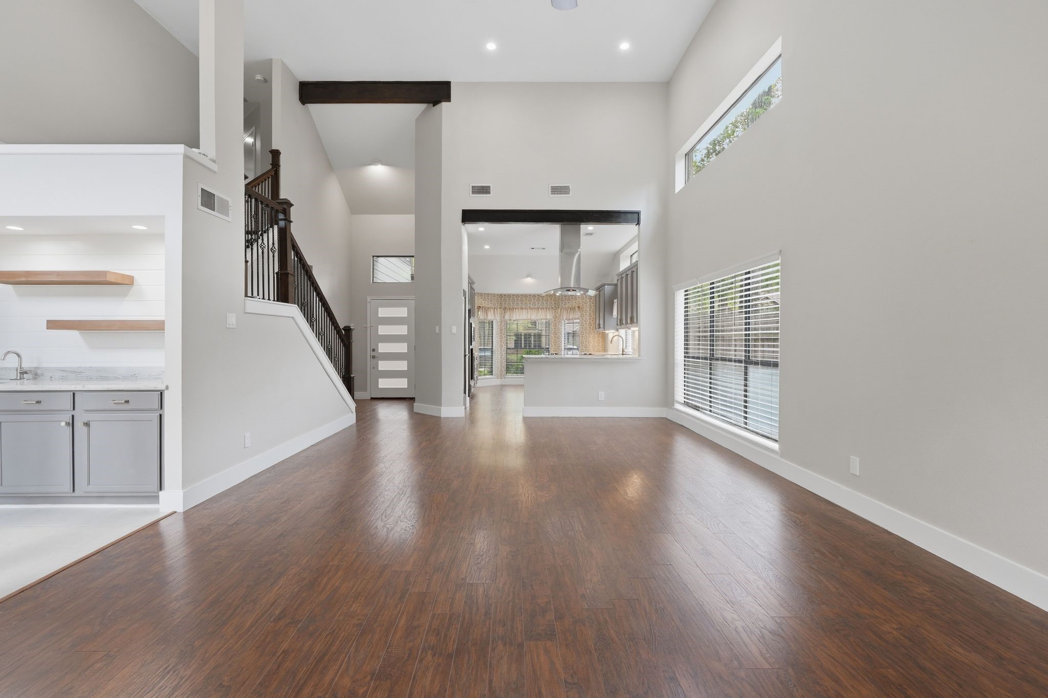14 Dusky Meadow Place Spring, TX 77381 - Photo 9 of 47 Off of the living room is a wet bar(to the left).