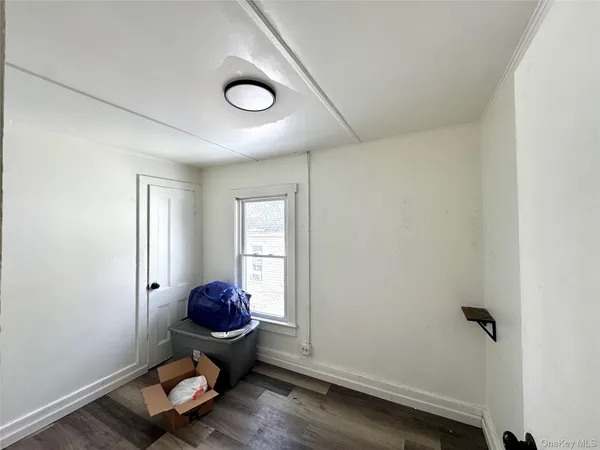 a room with furniture and a window