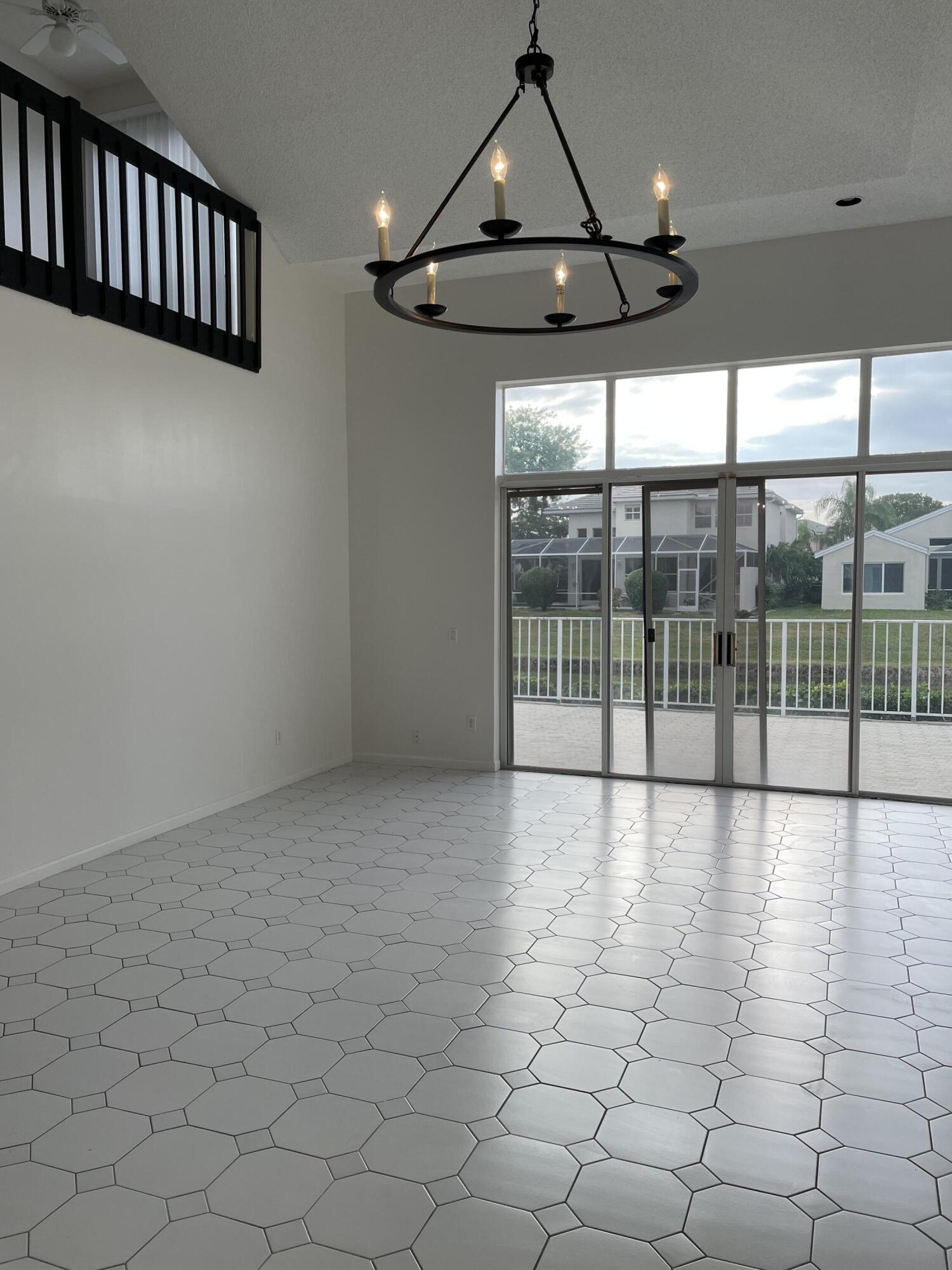23441 Butterfly Palm Court Boca Raton, FL 33433 - Photo 10 of 31 living room/dining room