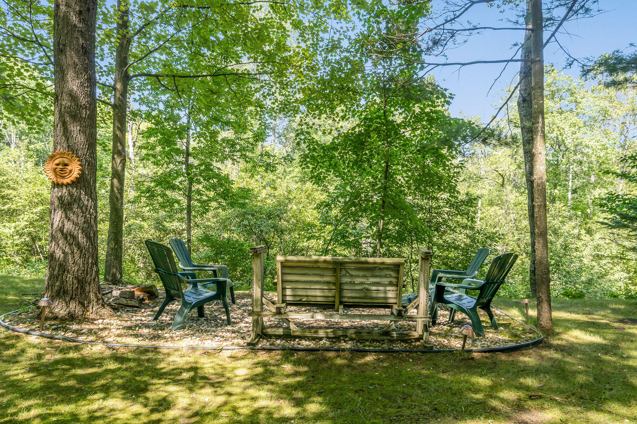 18753 Rapids Road Thompsonville, MI 49683 - Photo 9 of 46 firepit overlooking river