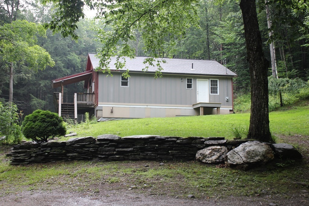 250 S Road Heath, MA 01346 - Photo 1 of 28 a view of a house with a yard and sitting area