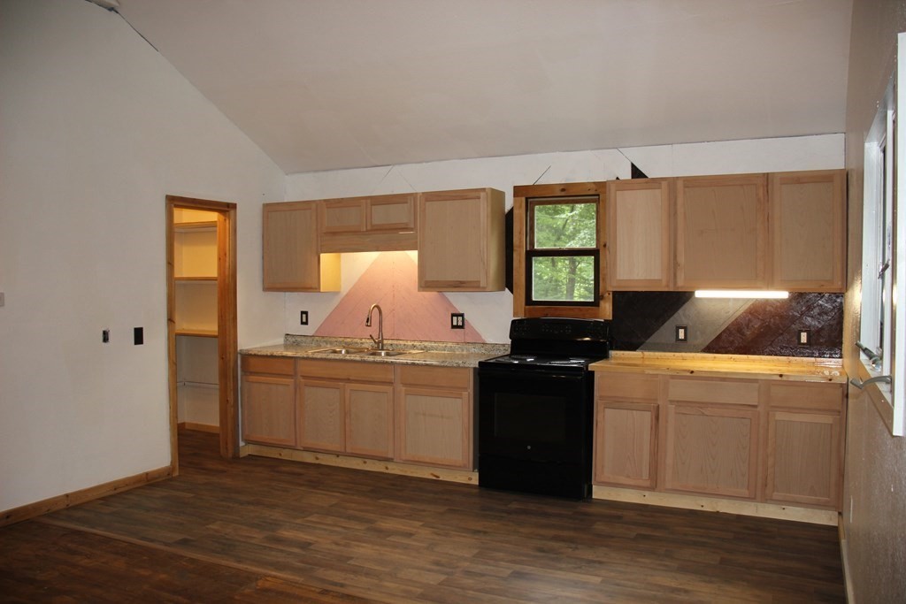 250 S Road Heath, MA 01346 - Photo 11 of 28 a kitchen with a cabinets and wooden floor