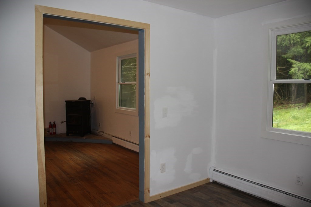 250 S Road Heath, MA 01346 - Photo 17 of 28 a view of a closet area with wooden floor