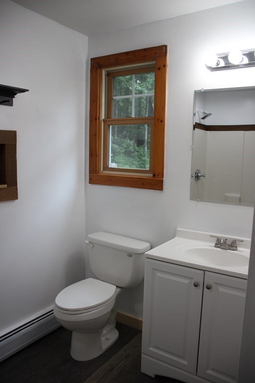 250 S Road Heath, MA 01346 - Photo 23 of 28 a bathroom with a toilet sink and mirror