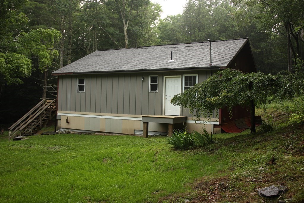 250 S Road Heath, MA 01346 - Photo 5 of 28 a view of a house with a yard and sitting area