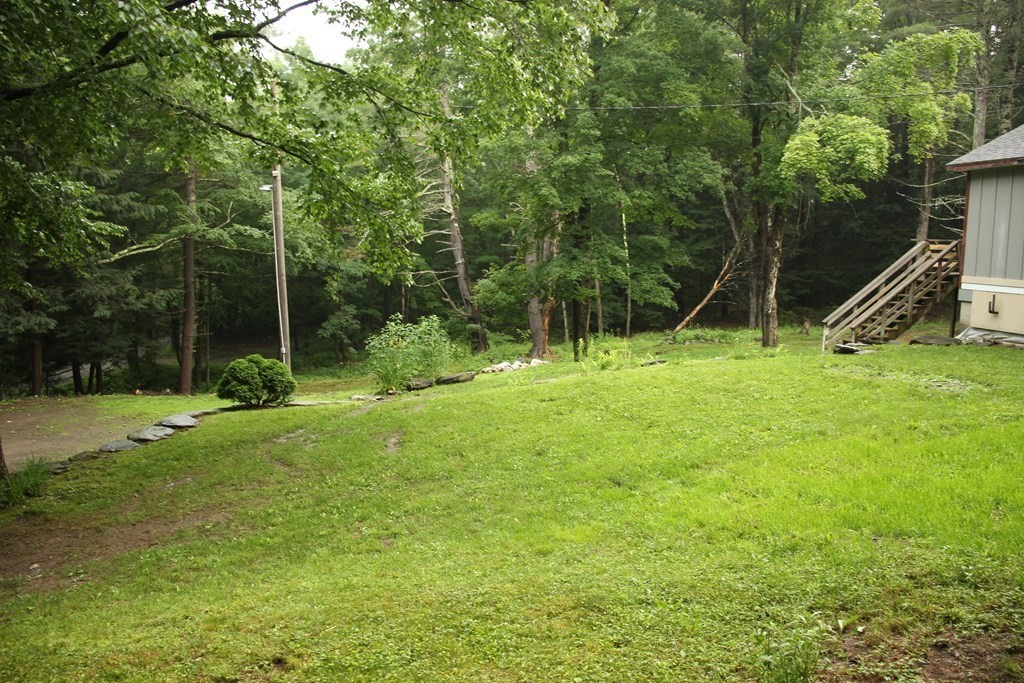 250 S Road Heath, MA 01346 - Photo 8 of 28 a view of outdoor space with deck and yard