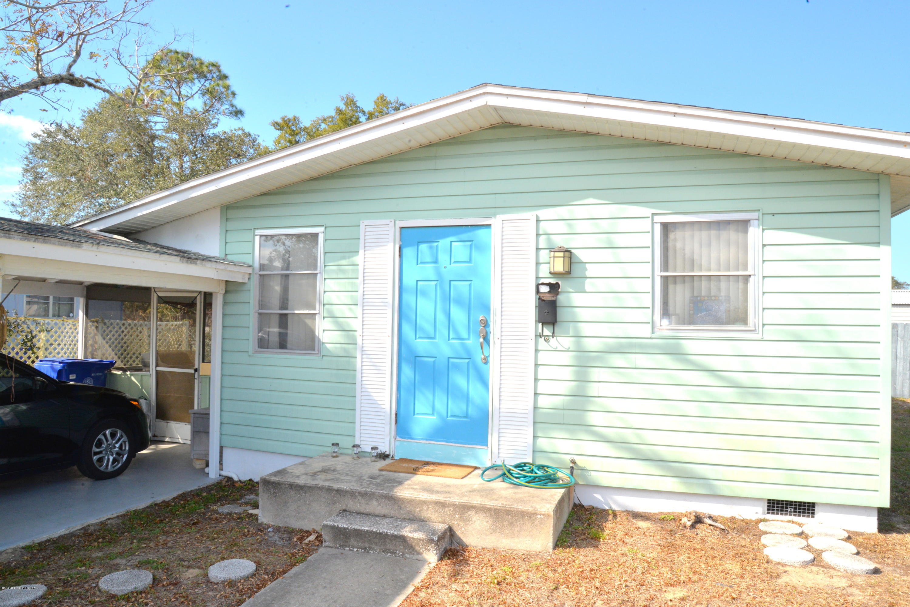 900 Palermo Road St. Augustine, FL 32086 - Photo 1 of 12 a car parked in front of a house