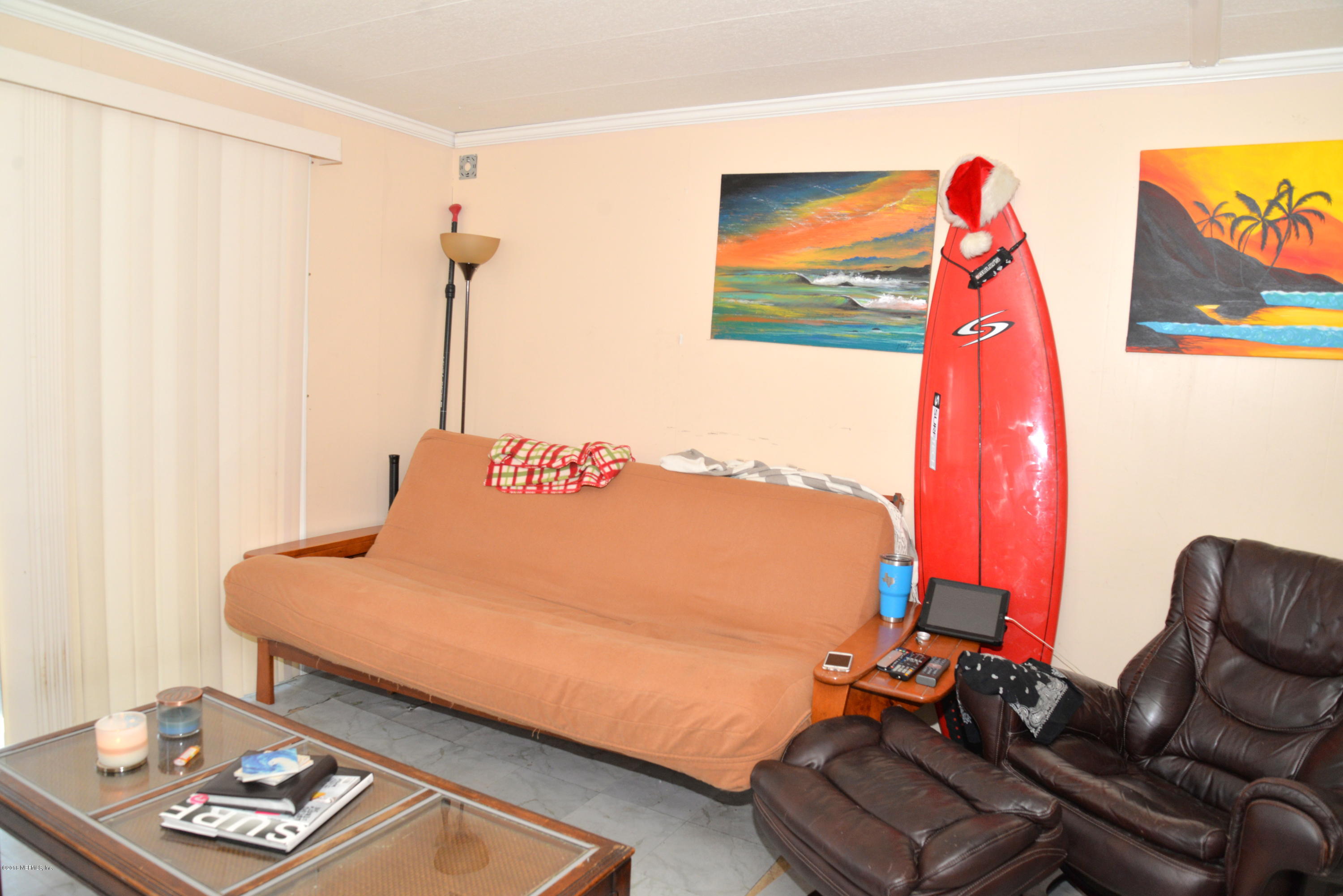 900 Palermo Road St. Augustine, FL 32086 - Photo 5 of 12 a bed room with a bed and a couch