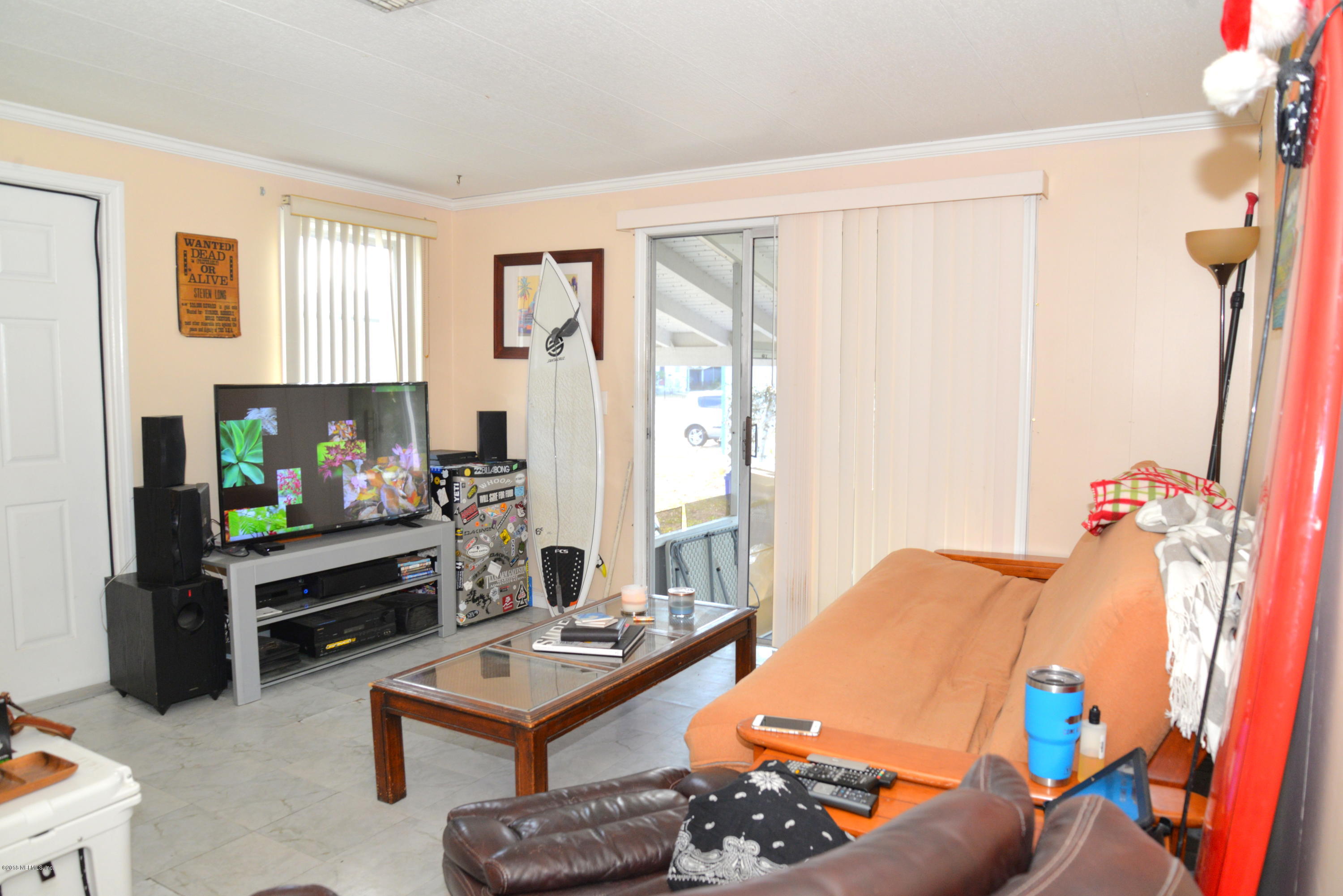 900 Palermo Road St. Augustine, FL 32086 - Photo 7 of 12 a living room with furniture and a flat screen tv