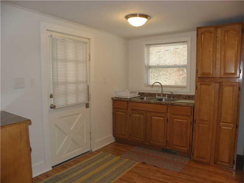 124 Weigles Hill Road Elizabeth, PA 15037 - Photo 2 of 19 Kitchen. Updated Kitchen w/ Newer Wood Cabinets appx June 2015, Newer Door appx 1 yr, to Covered Porch. Newer Flooring & Freshly Painted Aug 2015