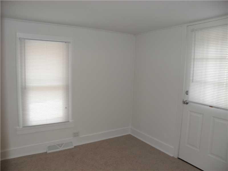 124 Weigles Hill Road Elizabeth, PA 15037 - Photo 7 of 19 Den. Front Room could be 3rd Bedroom or Den off Living Room (Door to side parking area)