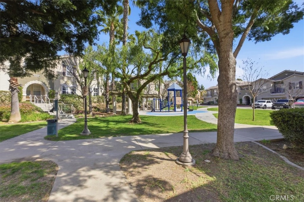 7353 Ellena West, Unit 70 Rancho Cucamonga, CA 91730 - Photo 35 of 40 a view of a park with large trees