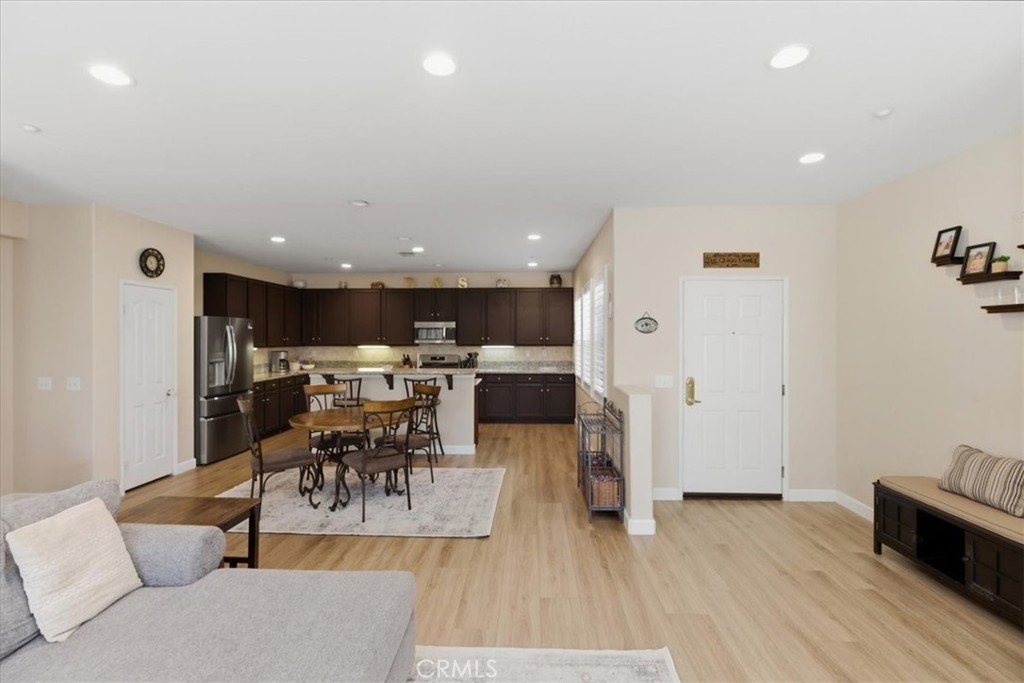 7353 Ellena West, Unit 70 Rancho Cucamonga, CA 91730 - Photo 8 of 40 a living room with furniture and a table