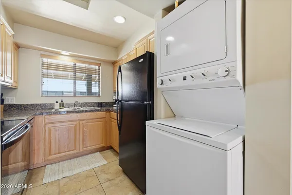 a utility room with washer and dryer