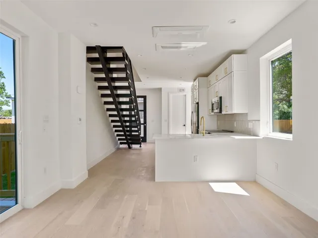 a view of kitchen and windows