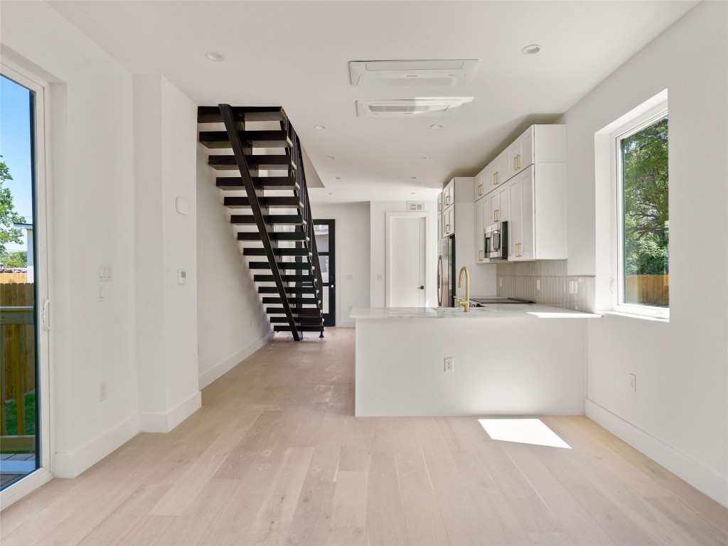 2609 Davis Lane, Unit 2 Austin, TX 78748 - Photo 11 of 26 a view of kitchen and windows