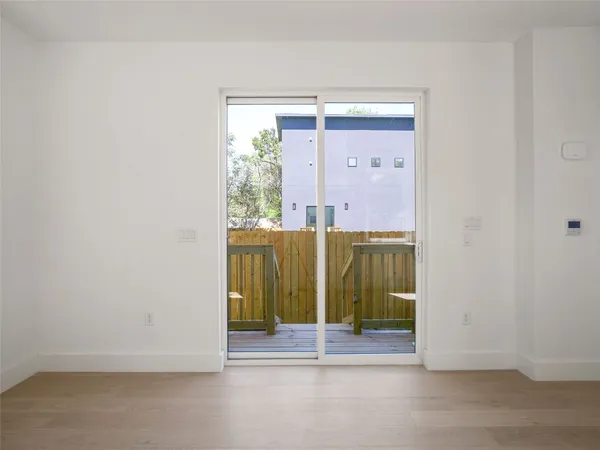 a view of a room that has a large window