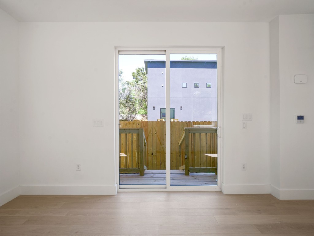 2609 Davis Lane, Unit 2 Austin, TX 78748 - Photo 12 of 26 a view of a room that has a large window