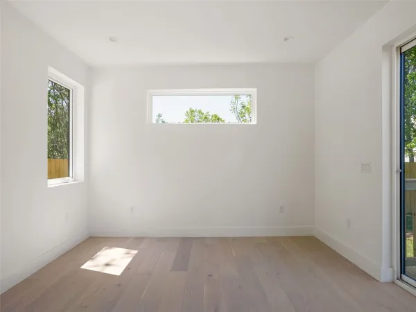 an empty room with windows