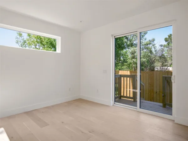 a view of a room with a large window
