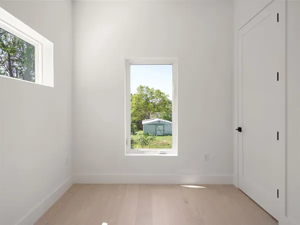 an empty room with a window