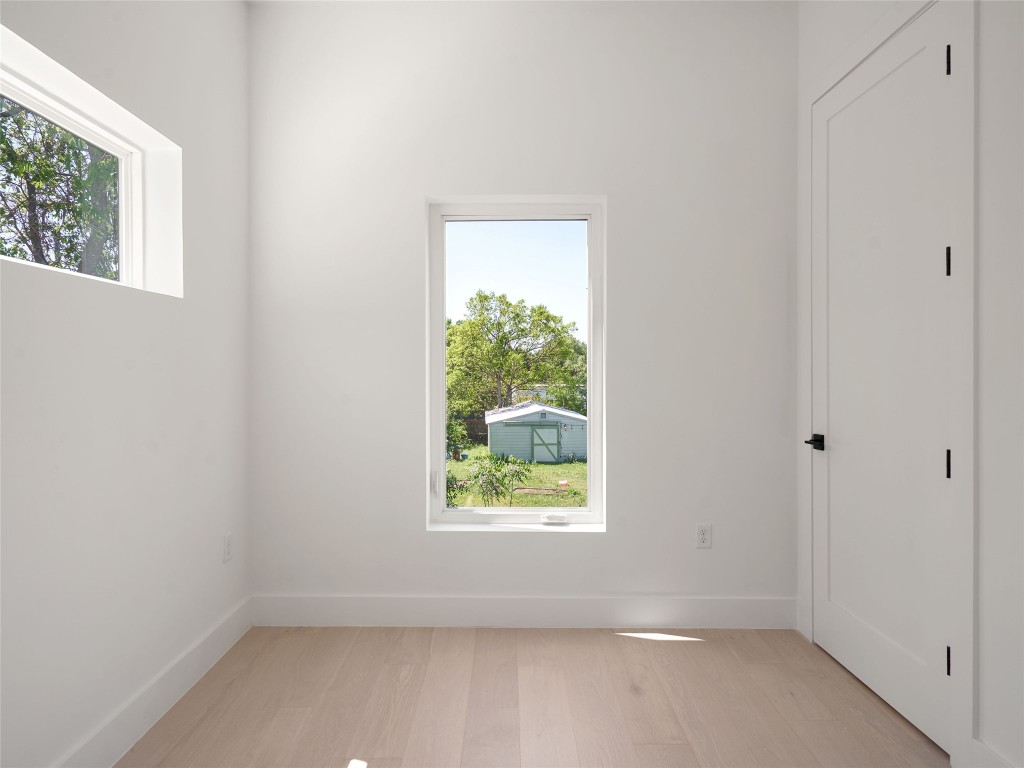 2609 Davis Lane, Unit 2 Austin, TX 78748 - Photo 18 of 26 an empty room with a window