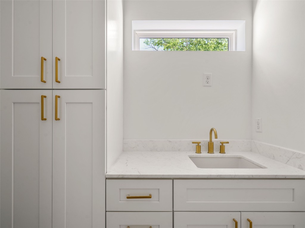 2609 Davis Lane, Unit 2 Austin, TX 78748 - Photo 21 of 26 a bathroom with a sink and a window